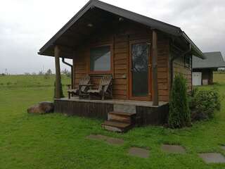 Кемпинги Iecupes wooden cabin with view to river Иецава