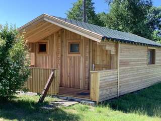 Лоджи Tranquil Log Cabin Retreat in Šventoji Швянтойи Четырехместный номер "Комфорт"-1