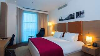 Отель DoubleTree by Hilton Oradea Орадя Люкс с 1 спальней и кроватью размера "king-size"-1