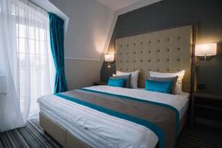 Отель Norm Hill Hotel Клуж-Напока Двухместный номер Делюкс с 1 кроватью или 2 отдельными кроватями и гидромассажной ванной-2