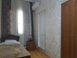 Гостевой дом Guest House Maria Сигнахи Трехместный номер с ванной комнатой-6