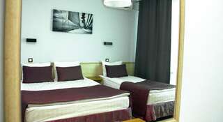 Гостиница Arriva Адлер Двухместный номер с 1 кроватью или 2 отдельными кроватями, боковой вид на море-9