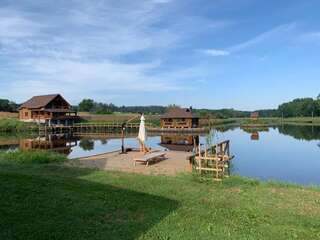 Загородные дома GuestHouse on the Lake with Bathhouse 70 km from Kiev Makariv