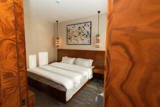 Отель East Astana Hotel Нур-Султан Улучшенный люкс с кроватью размера «king-size»-6