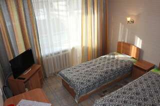 Отель Tourist Hotel Усть-Каменогорск Двухместный номер с 2 отдельными кроватями и душем-1