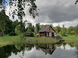 Дома для отпуска Cabin with Sauna and pond, optional Hot Tube Ķeņini