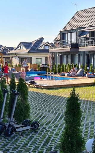 Апартаменты Vaivorykštės 7D apartamentai (su baseinu) Паланга