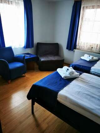 Фото номер Apartamenty Pod Lwem Двухместный номер с 2 отдельными кроватями