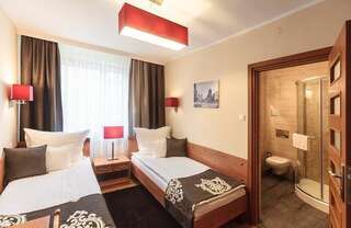 Фото номер Hotel Ratuszowy Двухместный номер с 2 отдельными кроватями