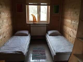 Фото номер Zagroda Chryszczata Двухместный номер с 2 отдельными кроватями и ванной комнатой