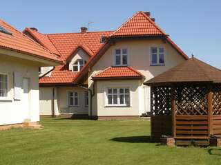 Дома для отпуска Holiday Home Mały dworek Леба Дом для отпуска-25