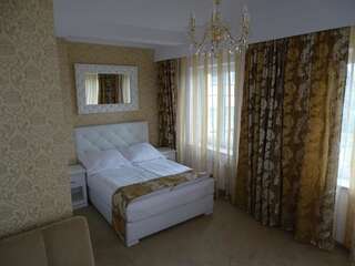 Фото номер Margerita Улучшенный двухместный номер с 1 кроватью или 2 отдельными кроватями