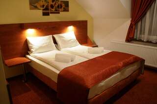 Фото номер Hotel Kuźnia Oberża Polska Большой двухместный номер с 1 кроватью или 2 отдельными кроватями