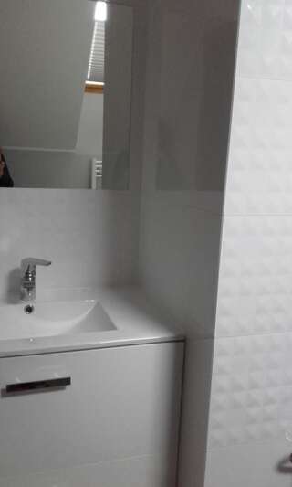 Фото номер Noclegi na Spokojnej Четырехместный номер с ванной комнатой