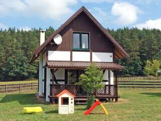Фото  The holiday house is located near the forest, 300 m from the lake, 6 km from sea город Lubkowo (43)
