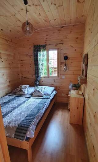 Дома для отпуска Domek drewniany nad jeziorem Zełwągi Дом с 2 спальнями-6