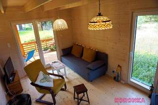 Фото номер Drewniany domek w Borach Tucholskich Koronka Дом с 1 спальней