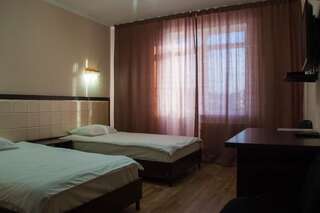Фото номер Гостиница Альтамира Стандартный двухместный номер с 2 отдельными кроватями