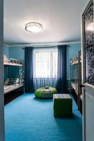 Фото номер SunHouse Hostel Karakol Кровать в общем 8-местном номере