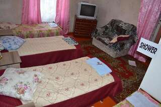 Фото номер Guest House on Derbisheva Двухместный номер с 1 кроватью или 2 отдельными кроватями