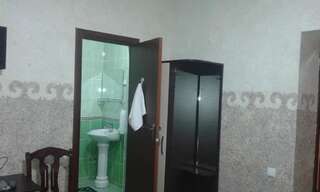 Фото номер Guest House Karakol Двухместный номер с 2 отдельными кроватями и ванной комнатой