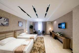 Отель Oasis Residence Бишкек Просторный двухместный номер с 2 отдельными кроватями-1