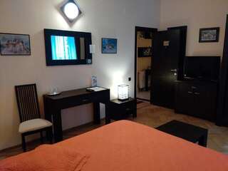 Фото номер Casa Vacanza Brasov Двухместный номер с 1 кроватью или 2 отдельными кроватями