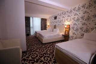 Отель Hotel Articus Крайова Улучшенный двухместный номер с 2 отдельными кроватями-5