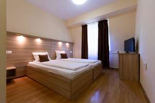 Отель Arcus Education Center Arcuş Стандартный двухместный номер с 1 кроватью или 2 отдельными кроватями-1