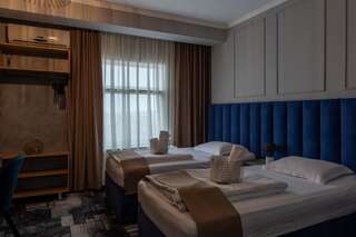 Отель Hotel PASO Клуж-Напока Двухместный номер Делюкс с 1 кроватью или 2 отдельными кроватями-10