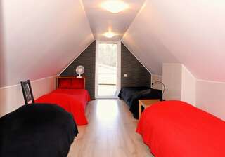 Фото номер Metsaääre Accommodation Дом для отпуска с 4 спальнями