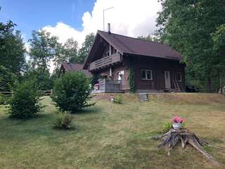 Дома для отпуска Деревянный дом с сауной и камином у леса, озера и СПА