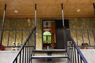 Фото номер Wooden Guesthouse Семейный номер с балконом