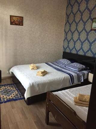 Гостевой дом Guest House Loza Сигнахи Трехместный номер с собственной ванной комнатой-11