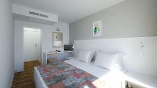 Фото номер Hotel Erma Двухместный номер с 2 отдельными кроватями, вид на сад