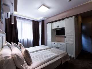 Фото номер Caro Apartments & Rooms Двухместный номер Делюкс с 2 отдельными кроватями