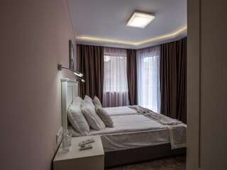 Фото номер Caro Apartments & Rooms Двухместный номер с 2 отдельными кроватями и видом на город