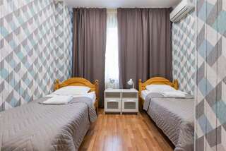 Фото номер Волна Номер с двумя отдельными кроватями и диваном