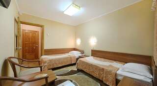 Фото номер Барнаул Односпальная кровать в общем номере с 2 кроватями