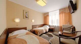 Фото номер Барнаул Односпальная кровать в общем номере с 2 кроватями