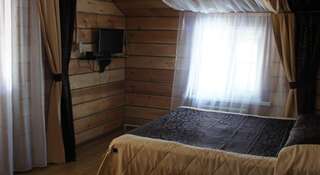 Фото номер Коттедж Ковчег Двухместный номер Делюкс с 1 кроватью и душем
