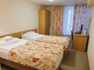 Фото номер АМАКС Сафар-Отель Стандартный двухместный номер с 2 отдельными кроватями