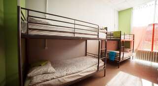 Фото номер Hostel Lastochka Кровать в общем 8-местном номере