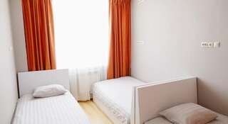 Гостиница Гостиница и Хостел Орда Улан-Удэ Кровать в общем четырехместном номере для мужчин и женщин-3