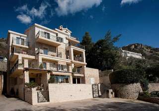 Апартаменты Apartments Vukšić Свети-Стефан