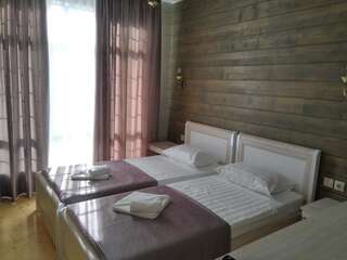 Фото номер Мини-гостиница Гагра Двухместный номер с 2 отдельными кроватями
