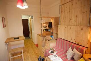 Апартаменты A cozy wooden studio in a heart of Kharkiv Харьков