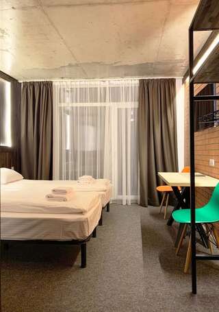 Отель Loft Hotel Буковель Двухместный номер с 1 кроватью или 2 отдельными кроватями-3