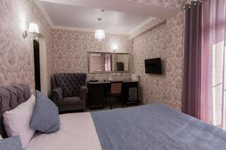 Фото номер Отель Классик Улучшенный двухместный номер с 1 кроватью или 2 отдельными кроватями