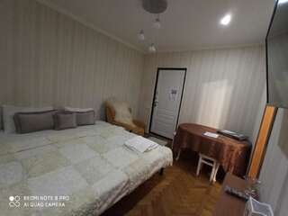 Фото номер Bd Stefan cel Mare Кишинёв Chisinau 62-белая Апартаменты с 1 спальней